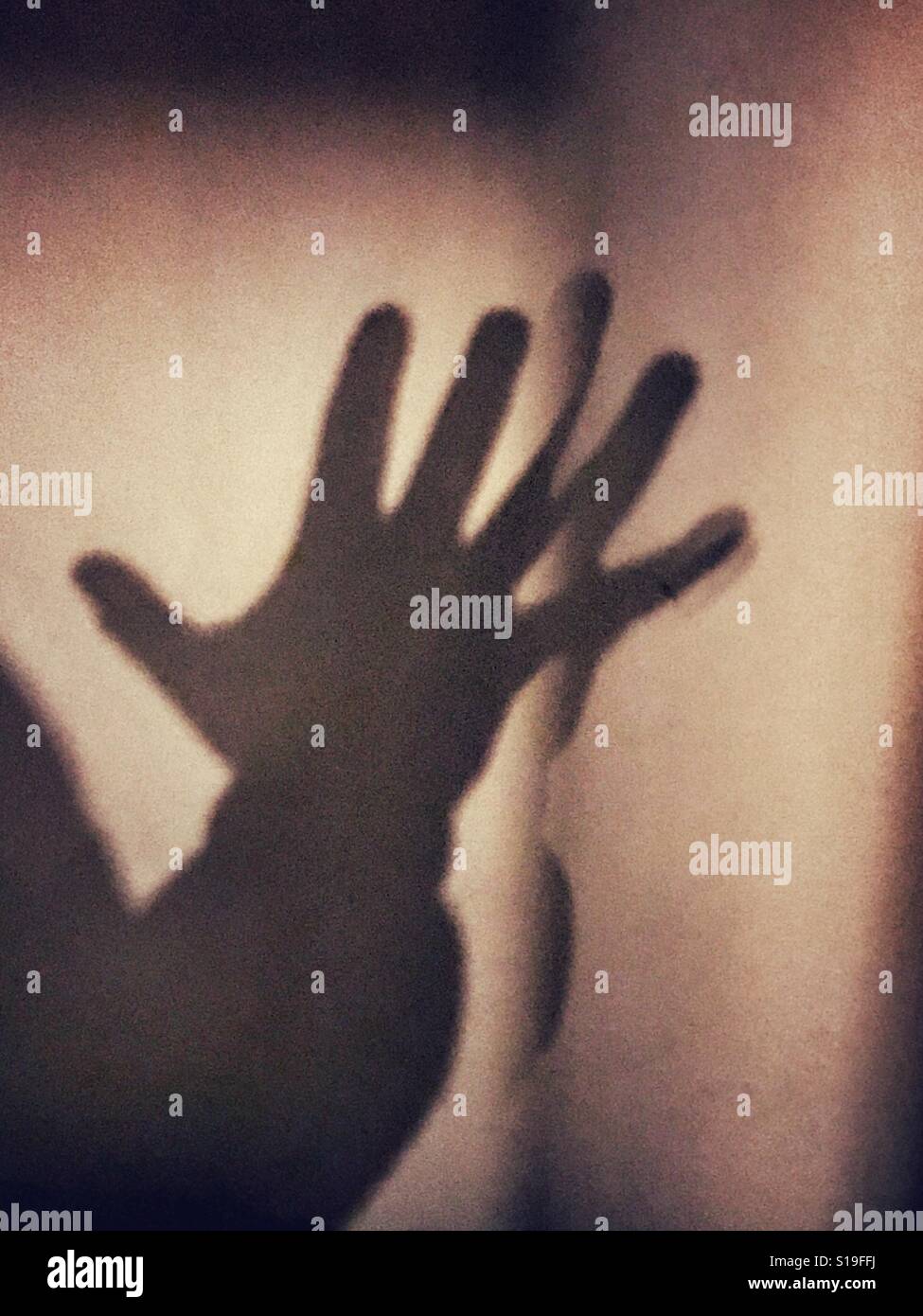 Ein Schatten einer menschlichen Hand Stockfoto