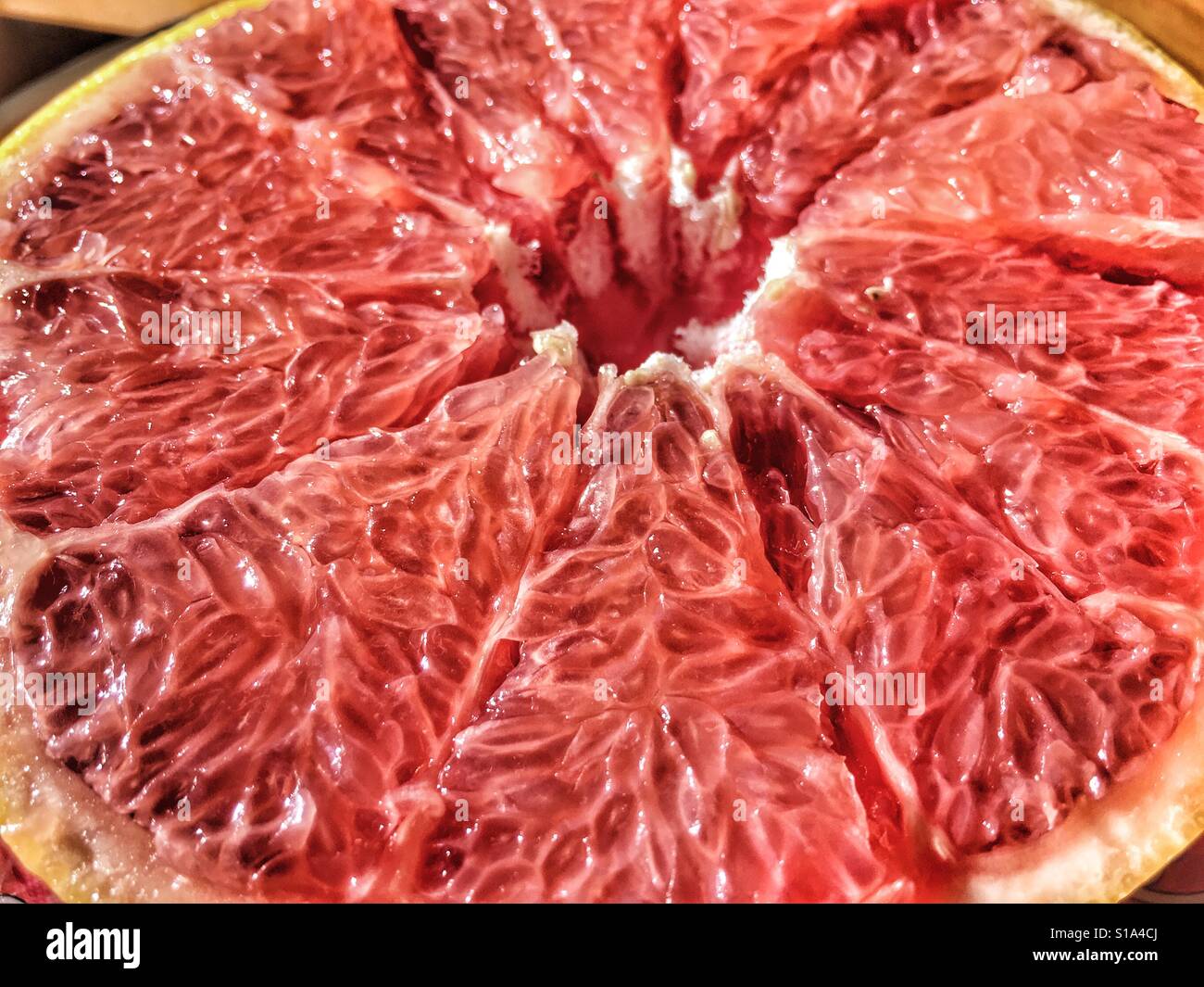 Rote Grapefruit, Nahaufnahme - Smartphone-aufgenommenes Stockfoto