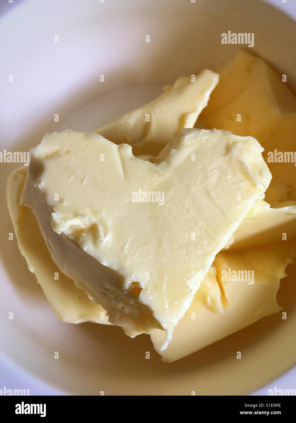Herzförmige butter Stockfoto