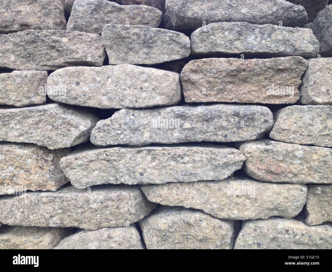 Nahaufnahme von einer Trockensteinmauer. Cotswolds, England. Von Matthew Oakes genommen. Stockfoto