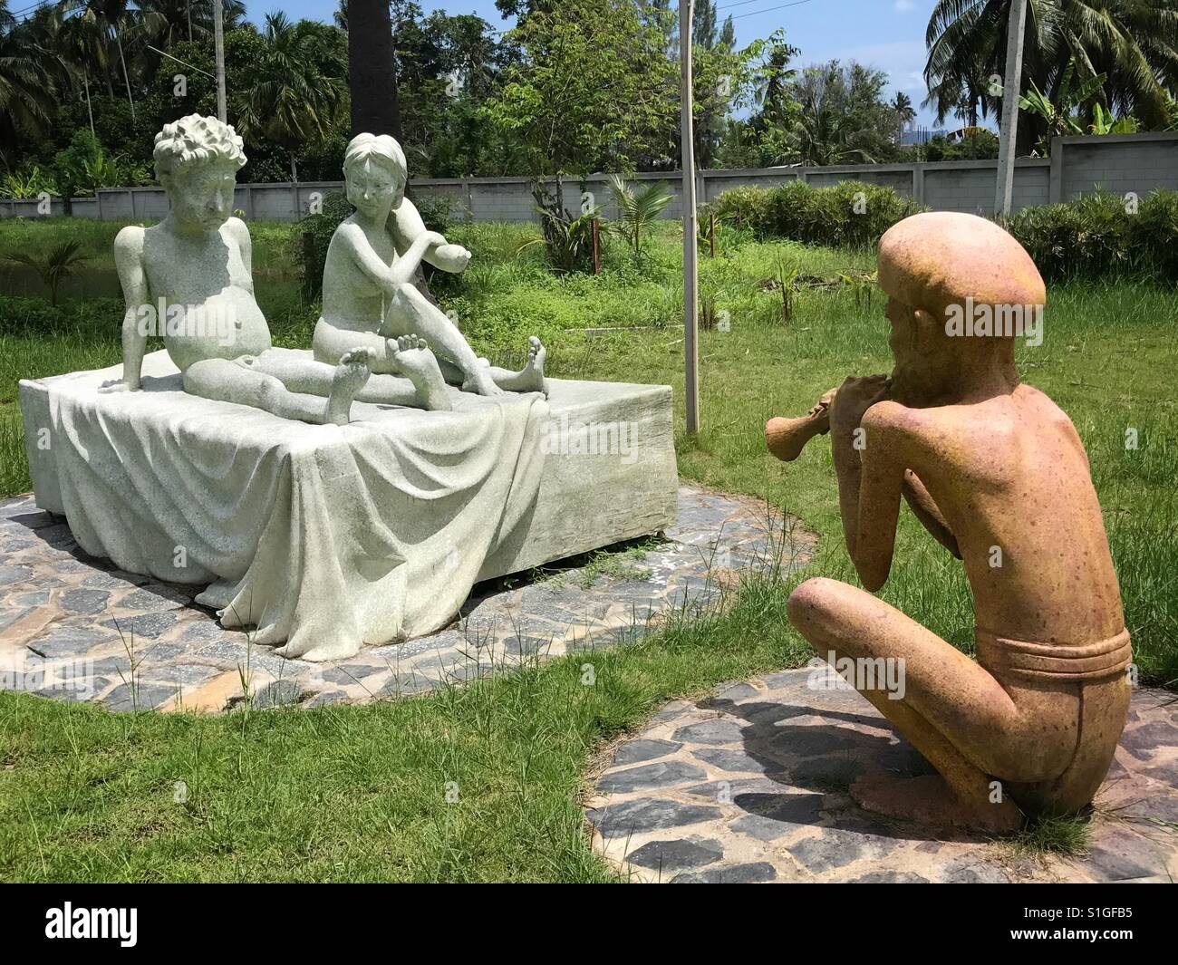 Statue von einem indischen Charmeur nach dem ehelichen Schlafzimmer gerufen, um erektile Dysfunktion zu unterstützen - Smartphone-aufgenommenes Stockfoto