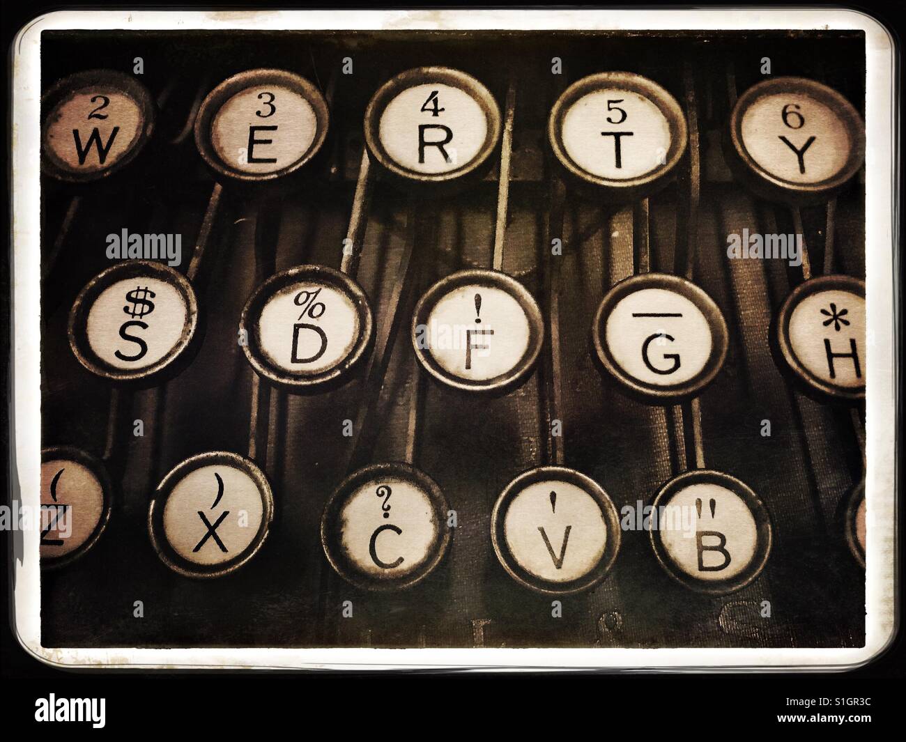 Antike Schreibmaschine mit runden Tasten-sepia Stockfoto