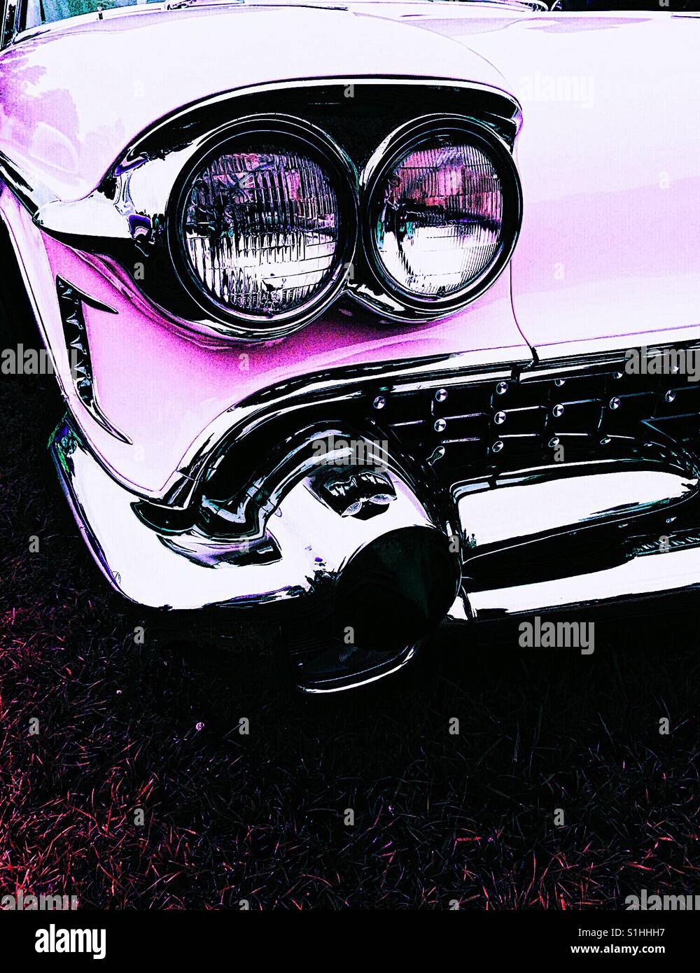 Rosa Oldtimer Scheinwerfer und Chrom Stockfoto