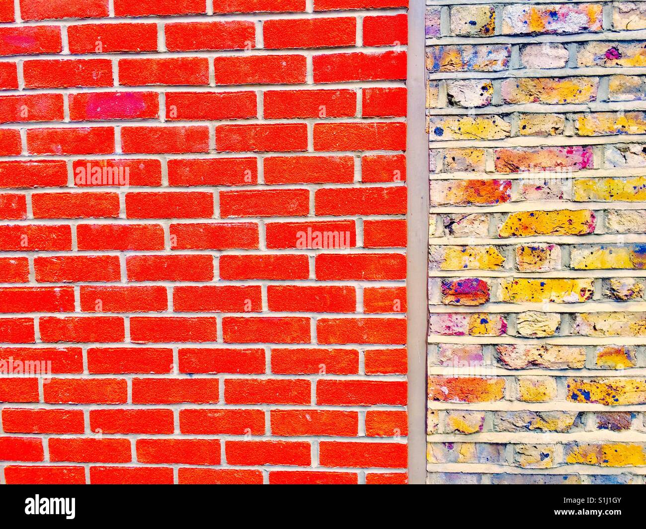 Alte und neue Ziegel Wände in London in England Stockfoto
