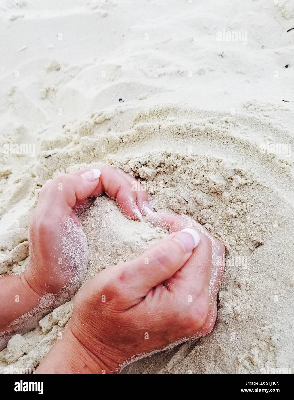 Oh mein Herz in den Sand. Man muss den Bahamas lieben. Stockfoto