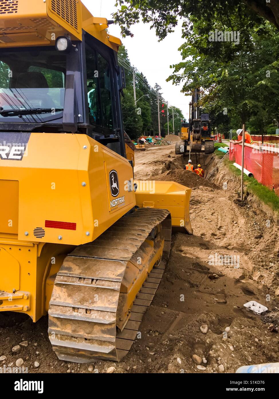 Verlegung von Abwasserkanälen - Smartphone-aufgenommenes Stockfoto
