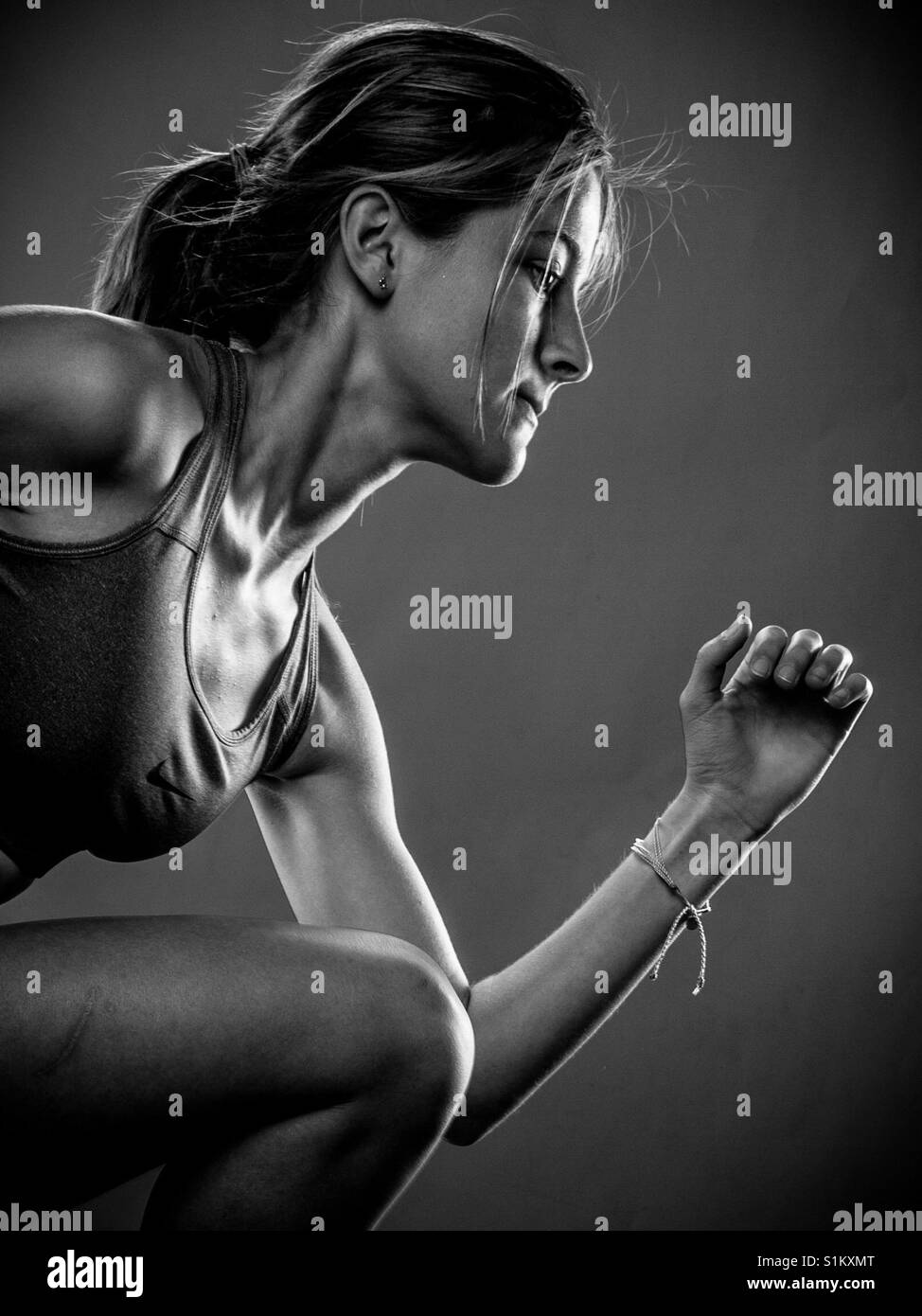 Schwarz / weiß muskulöse weibliche Läufer Stockfoto