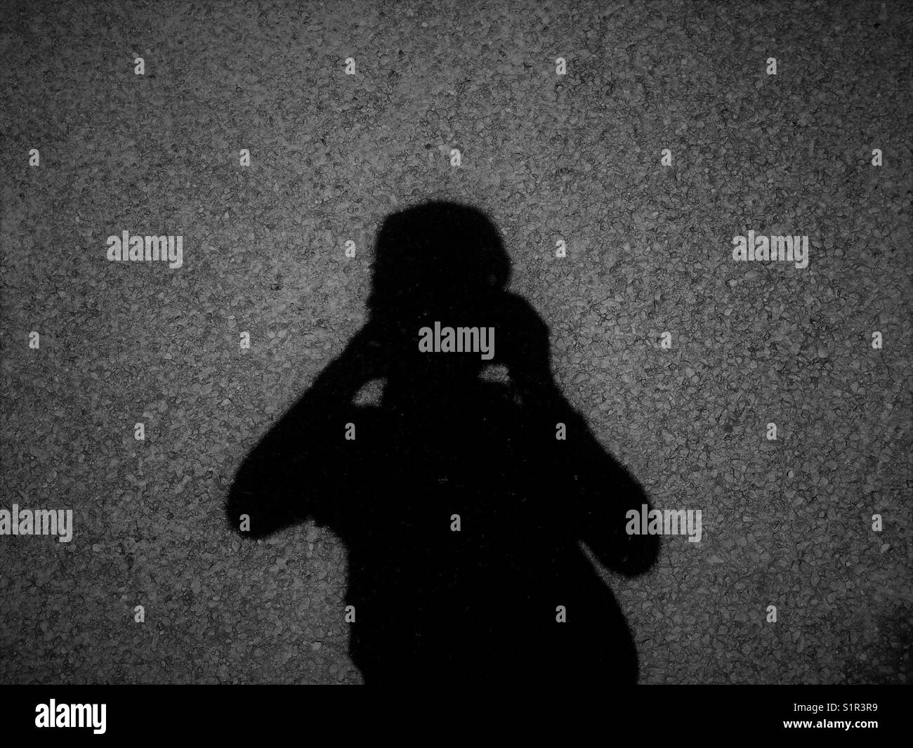 Silhouette Schatten eines jungen Menschen. Stockfoto