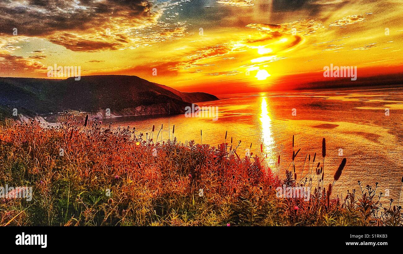 Sonnenuntergang über der Küste von Cape Breton Island, Nova Scotia, Kanada Stockfoto