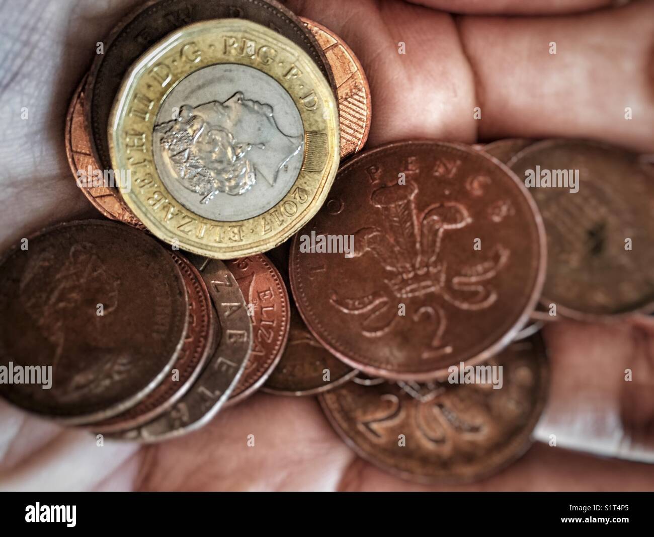 Eine Handvoll von Loose Change Stockfoto