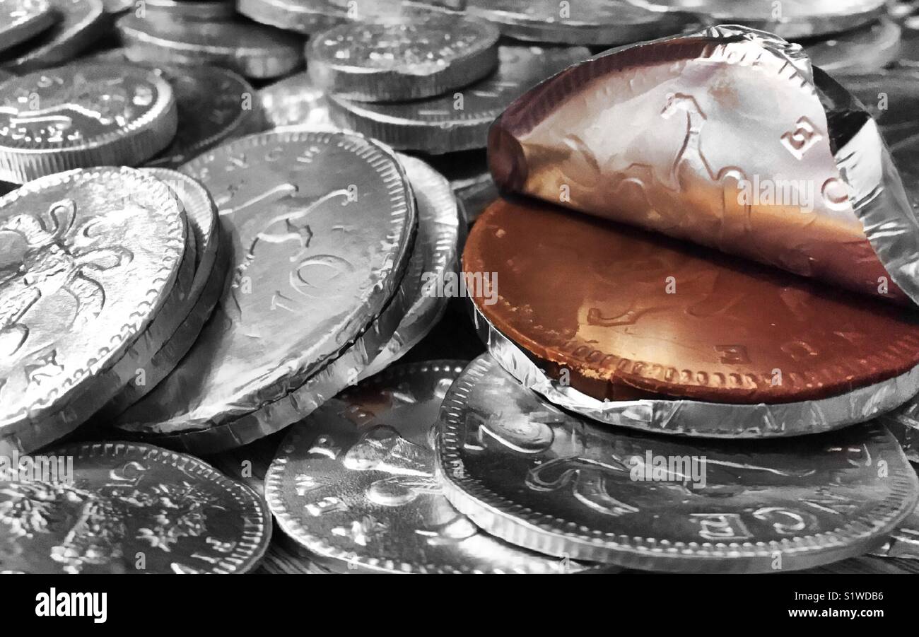 Geld Münzen Schokolade Spaß Stockfoto