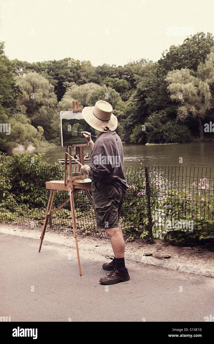 Mann Malerei am Central Park Stockfoto