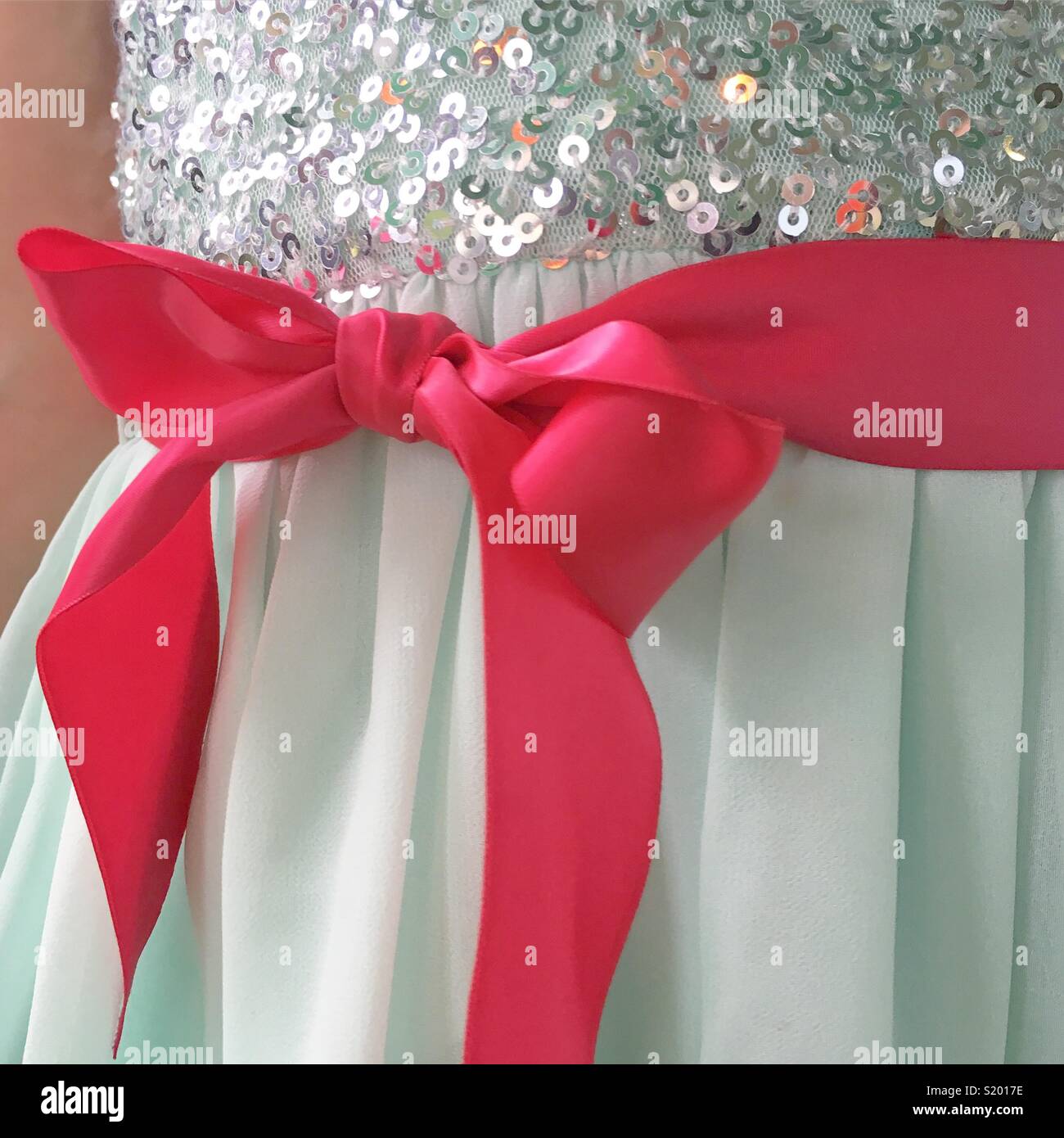 Pastell grün und pink Pailletten Kleid detail Stockfoto