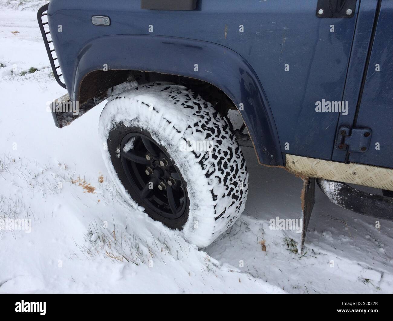 Rad im Schnee Stockfoto