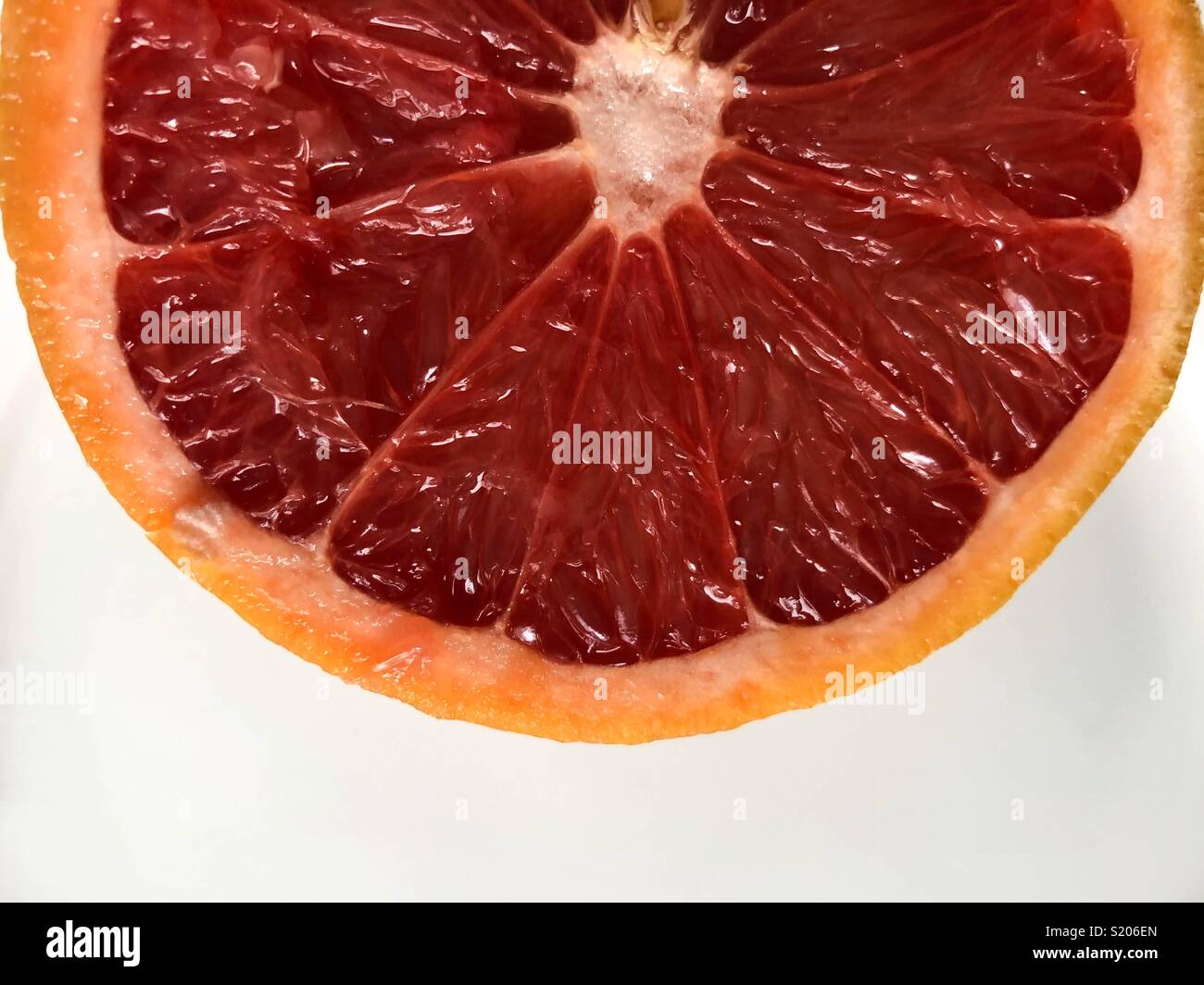 Innerhalb einer Grapefruit - Smartphone-aufgenommenes Stockfoto