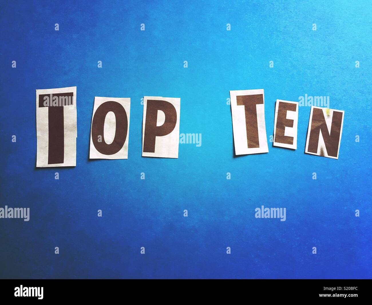 Top ten heraus auf einem blauen Hintergrund geschrieben Stockfoto