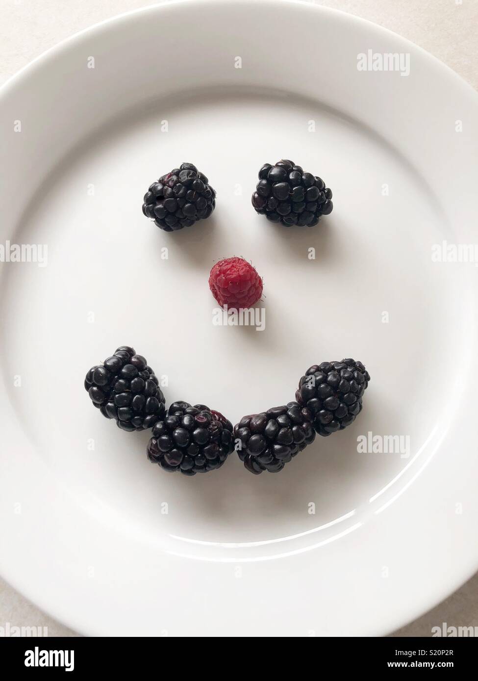Blackberry und Himbeere Smiley Stockfoto