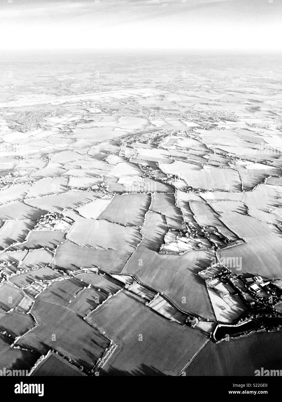 Landwirtschaftliche Landschaft, gesehen aus einem Flugzeug. Stockfoto