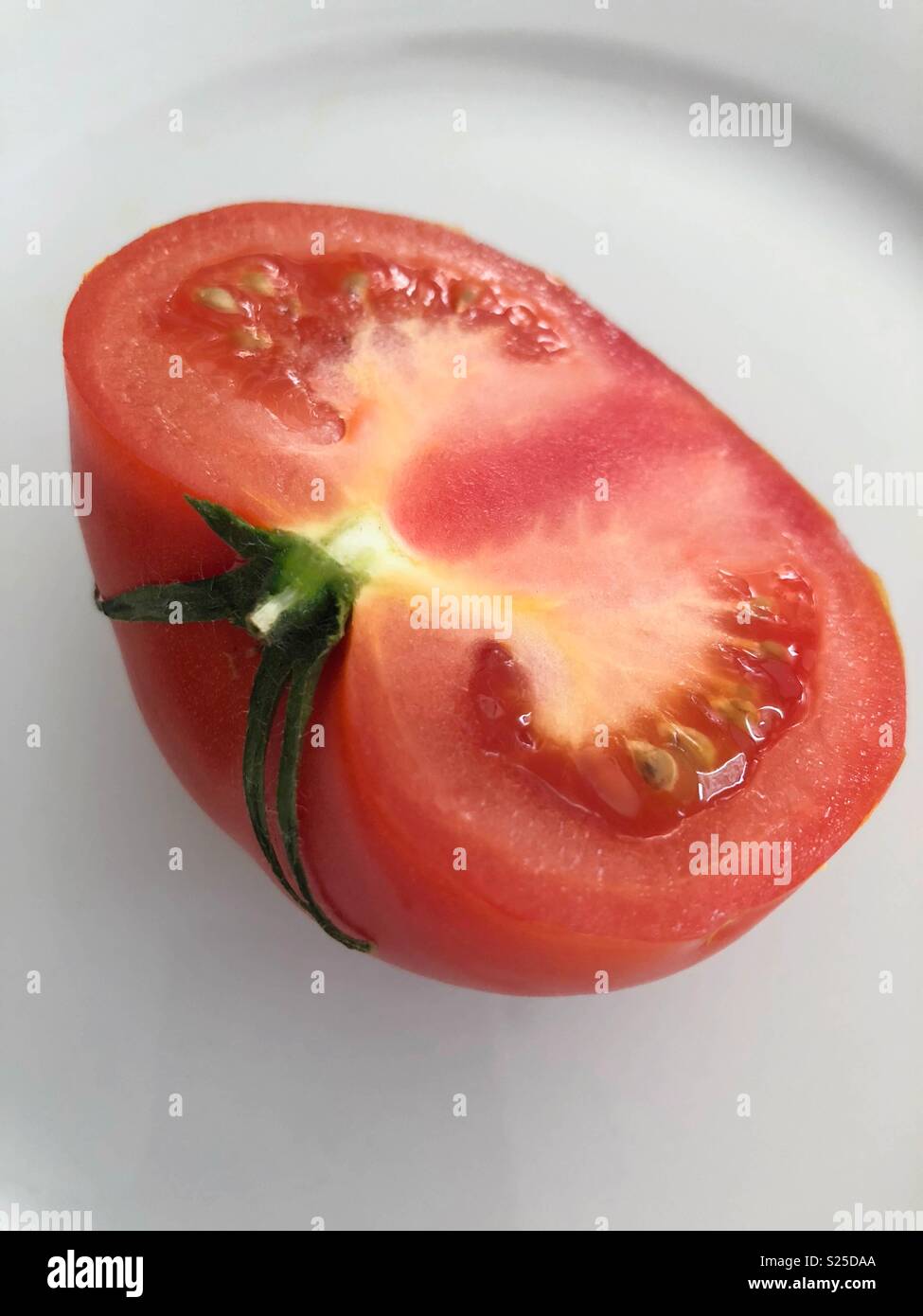 Tomaten die Hälfte Stockfoto