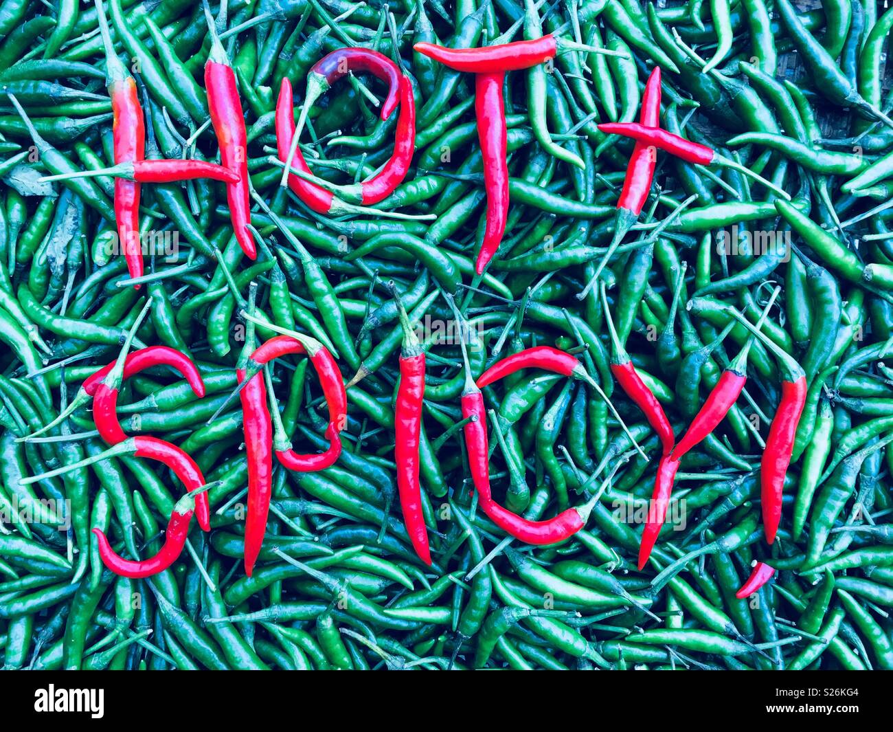 Heiß und würzig! In chili peppers Geschrieben Stockfoto