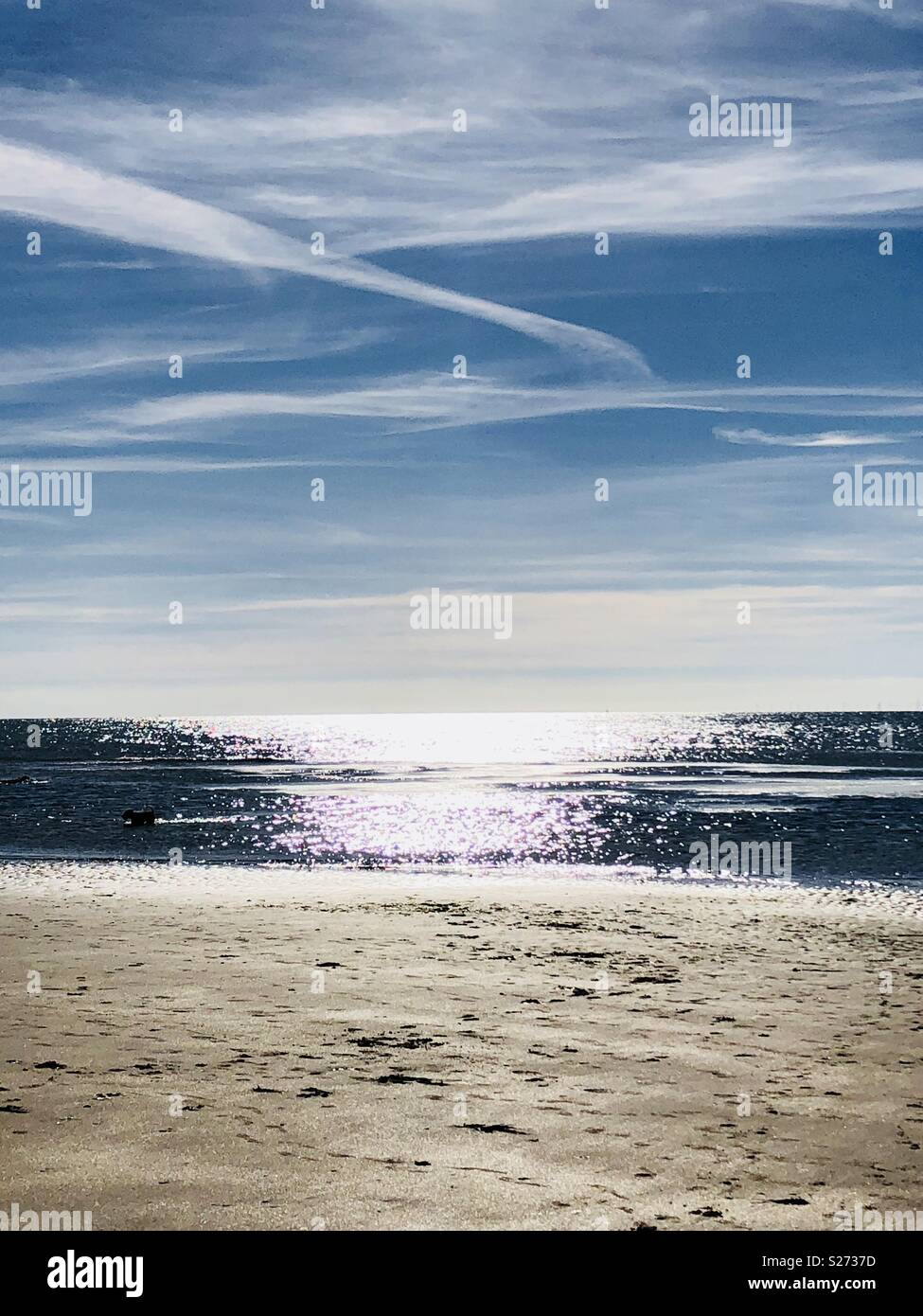 Sand, Meer und Himmel Stockfoto