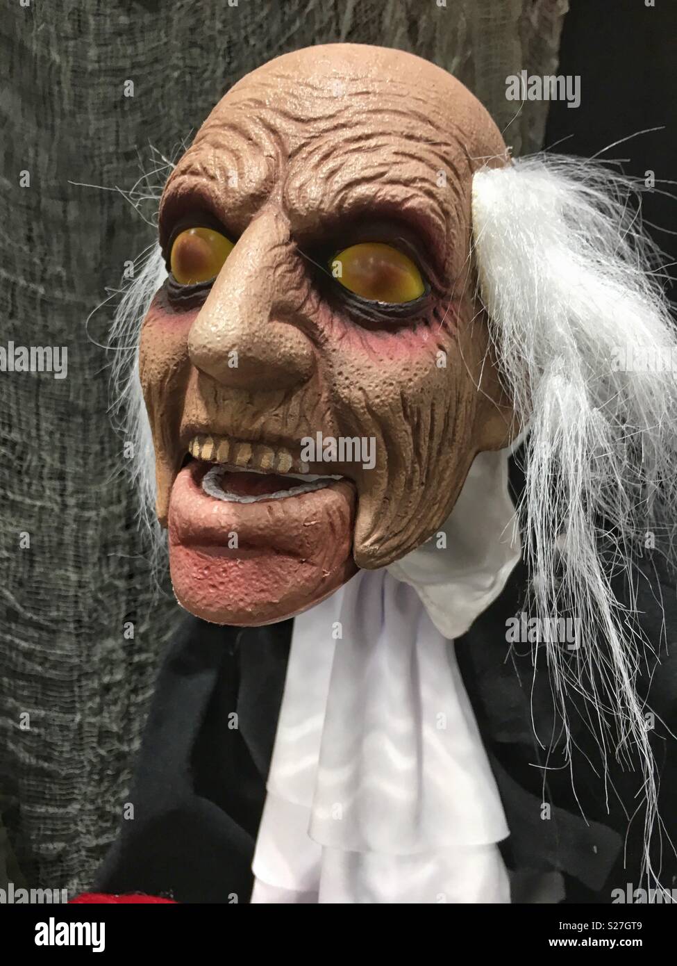 Eine Halloween scary männliche Gesicht Maske eines Butler Stockfoto