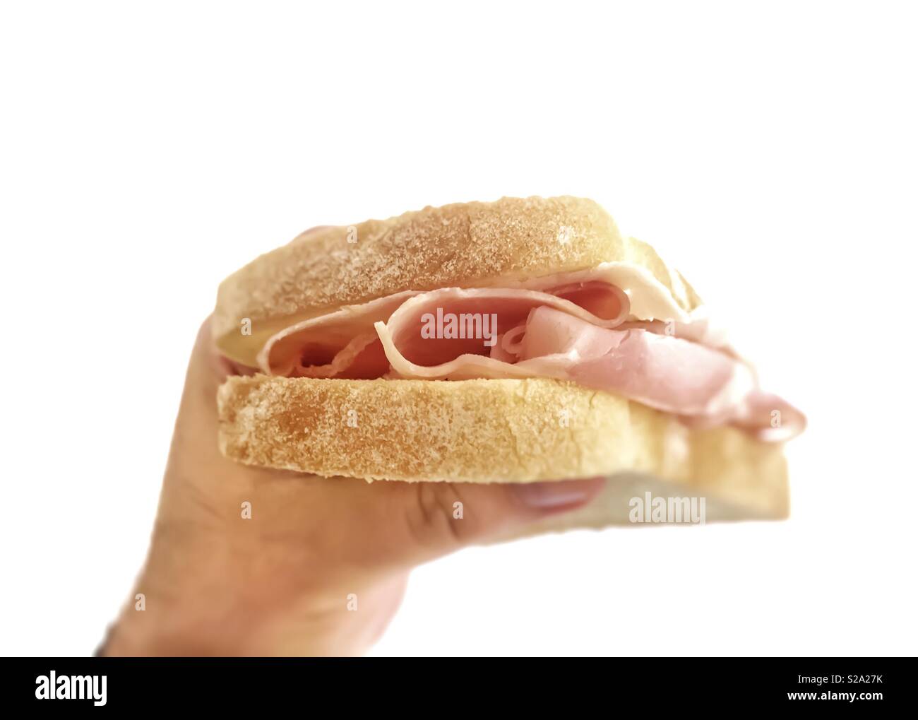 Männliche hand mit einem gebackenen Schinken Sandwich - Smartphone-aufgenommenes Stockfoto