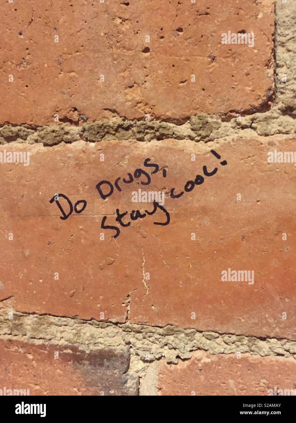 Schlechte Beratung Wand - Smartphone-aufgenommenes Stockfoto