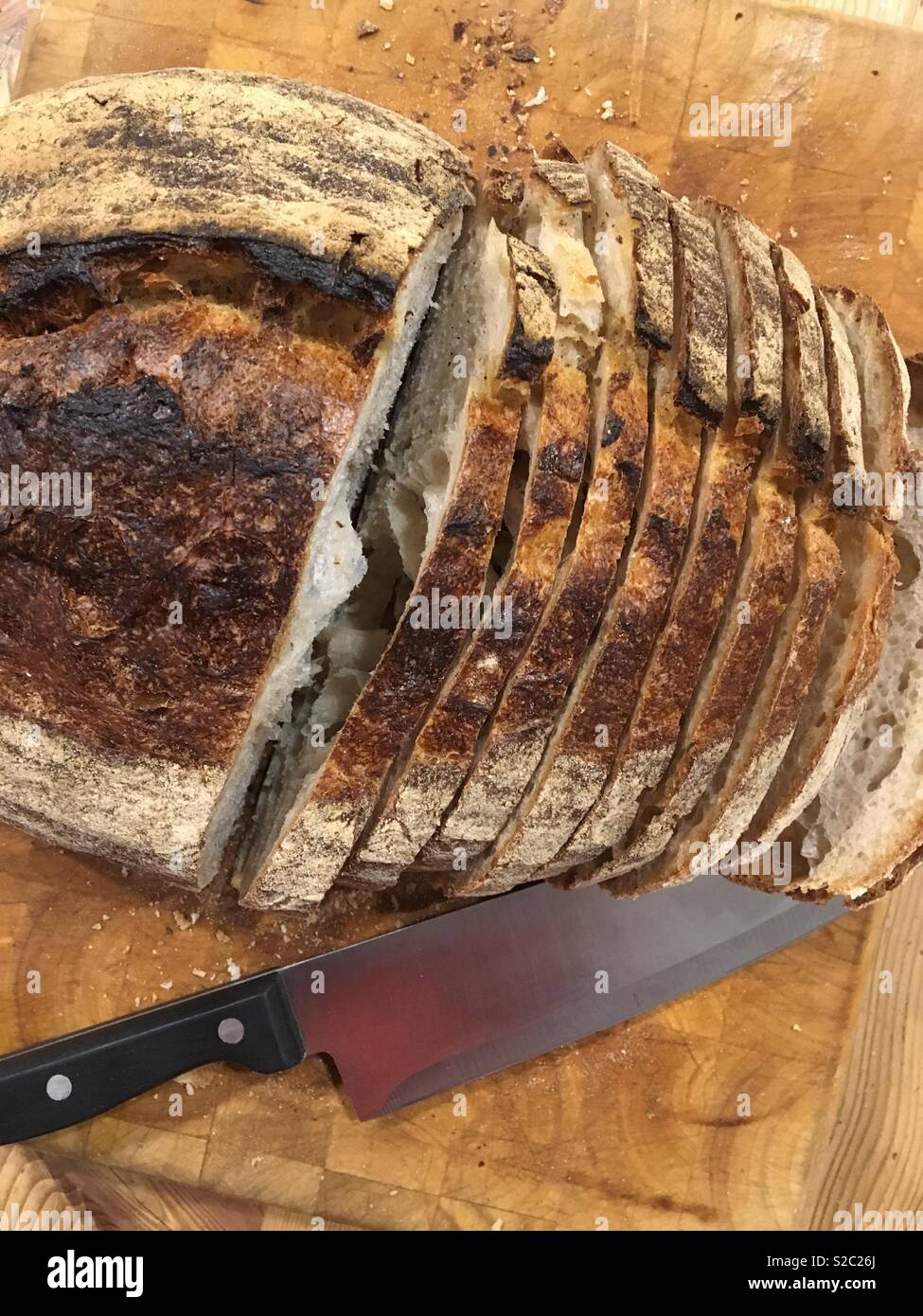 Brot schneiden Stockfoto