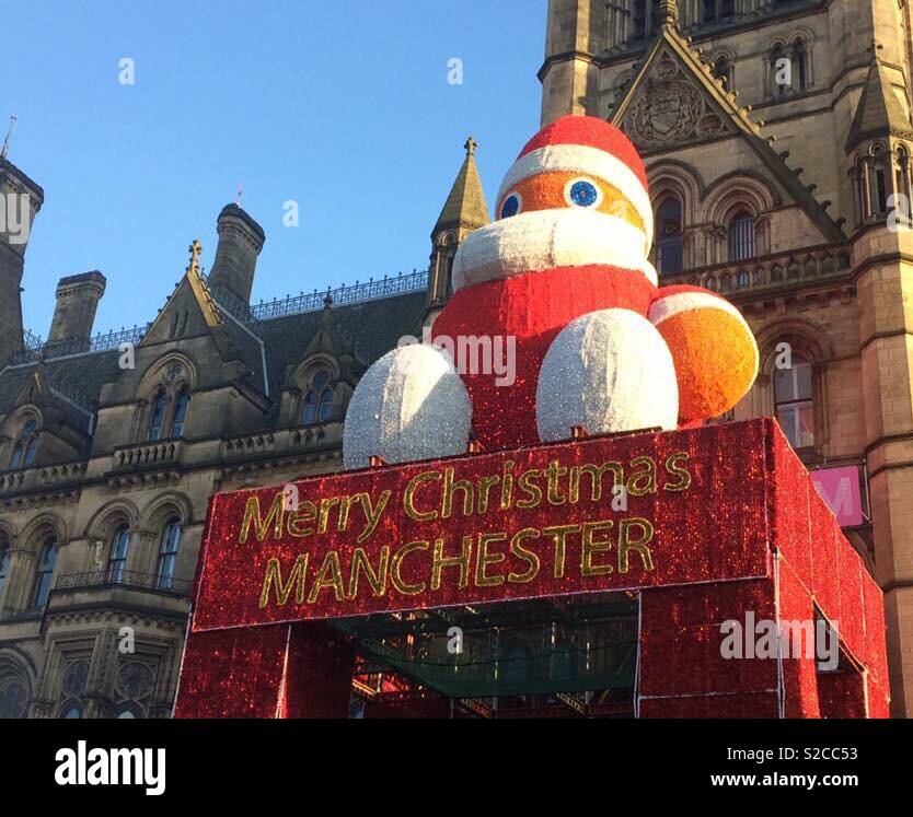 Die "Merry Christmas Manchester" Schild am Manchester Weihnachtsmärkte, Albert Square, Manchester. Stockfoto