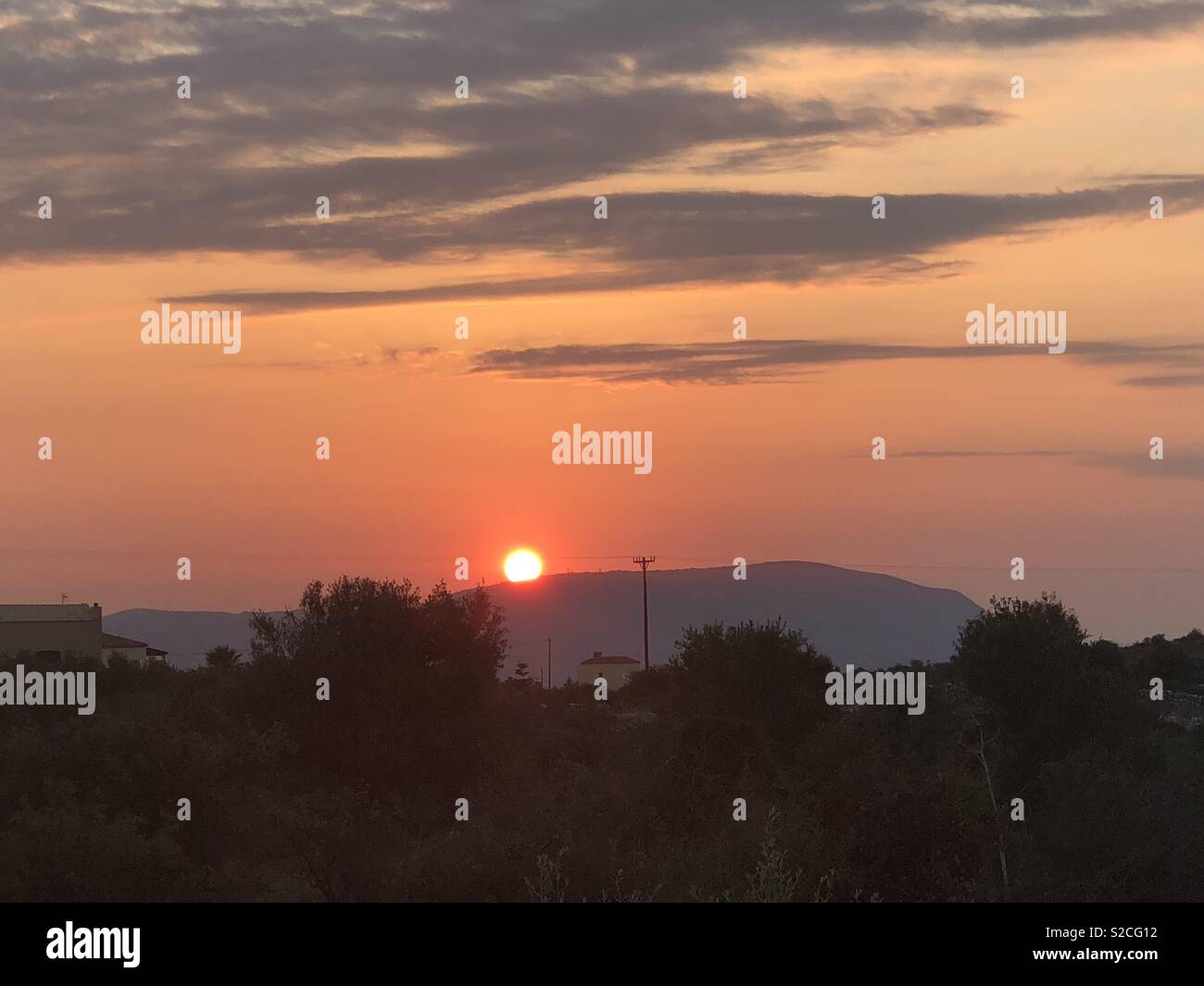 Nichts wie ein griechischer Sonnenuntergang von Vamos Kreta Stockfoto
