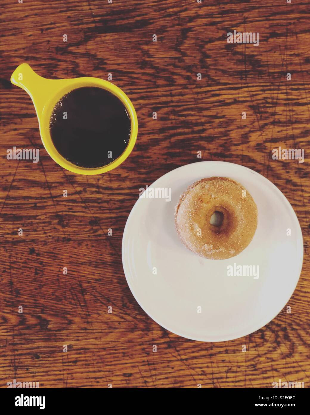 Kaffee und Donut Stockfoto