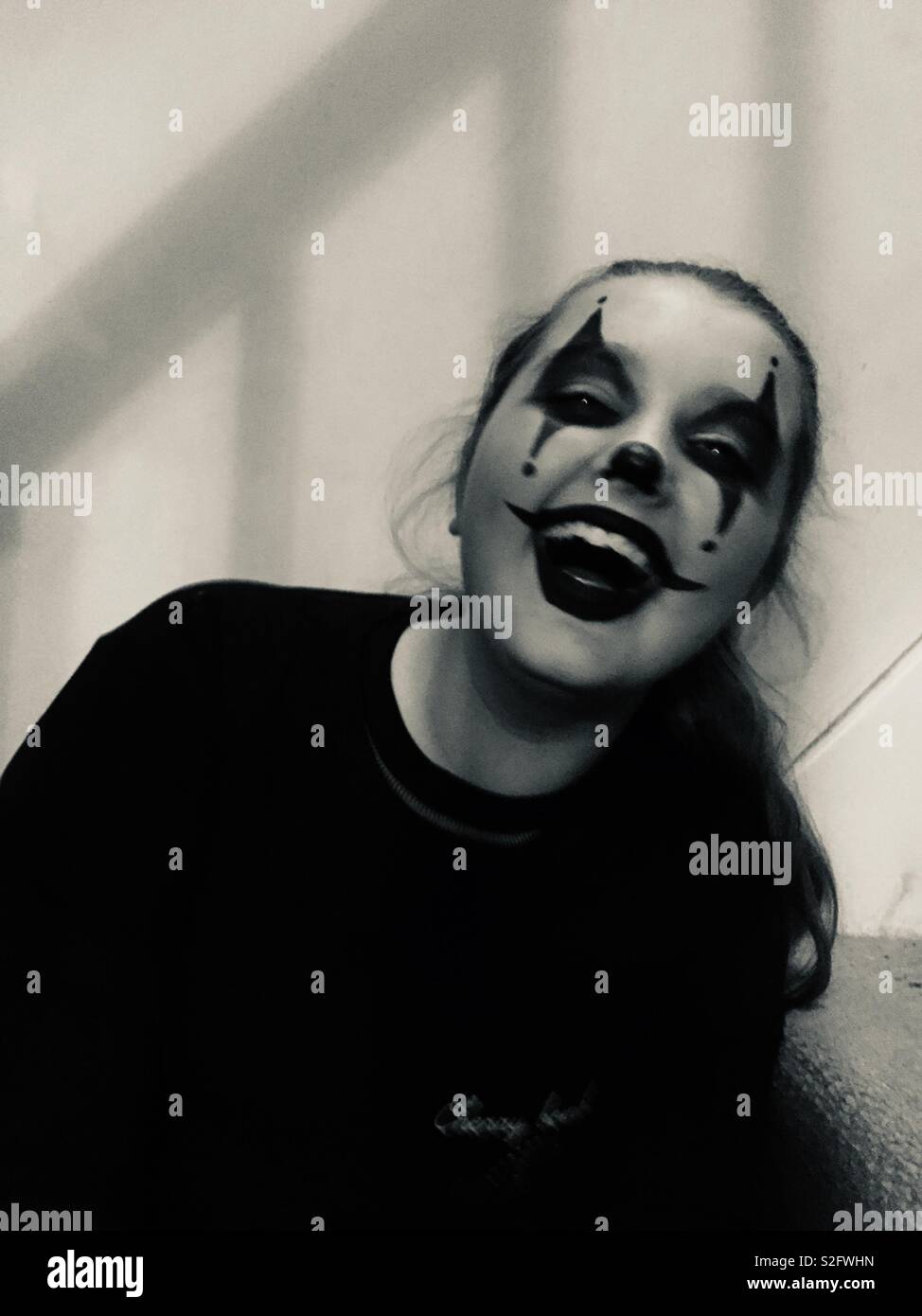 Lachende Mädchen clown Stockfoto