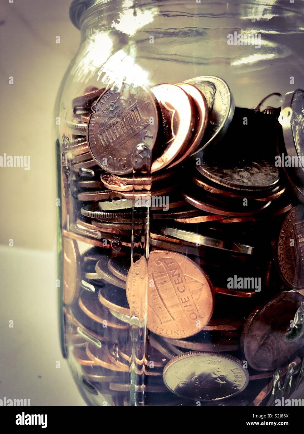 Nahaufnahme von einem jar von Münzen Stockfoto