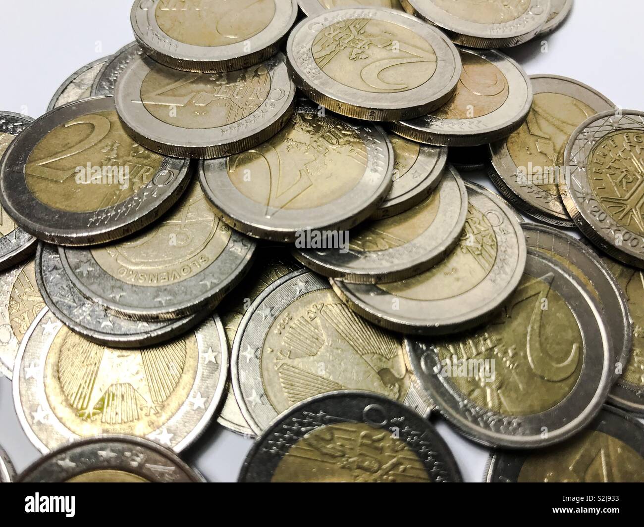 Erbärmliche zwei Euro Münzen Stockfoto