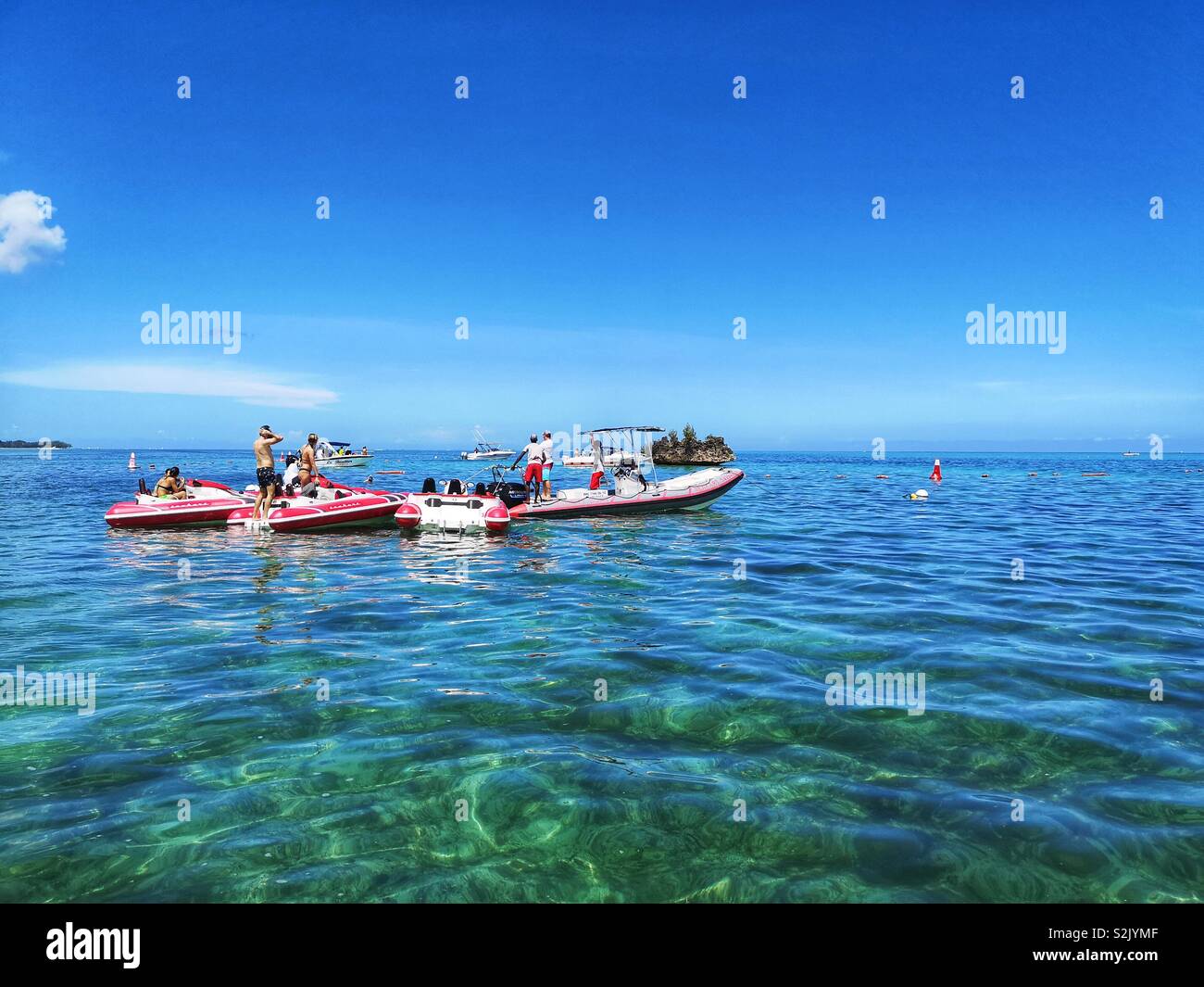 Touristen genießen die Sonne und Bootsfahrt in den Indischen Ozean, Mauritius Stockfoto