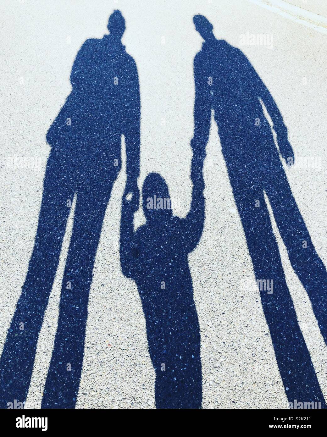 Mama Papa und Baby Schatten Stockfoto