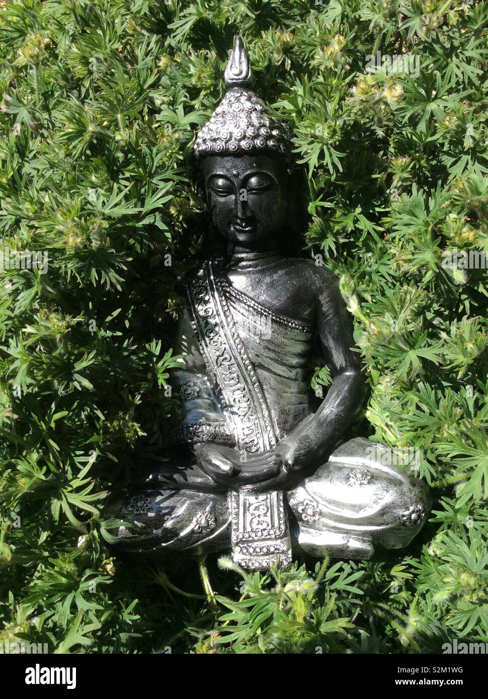 Meditierende buddha figur Fotos und Bildmaterial in hoher Auflösung