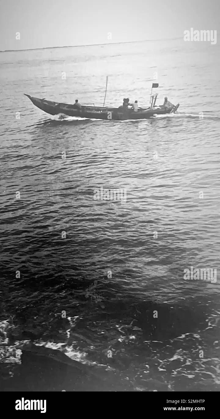 Fisherman's Boot auf dem Meer erfassen Essen Stockfoto