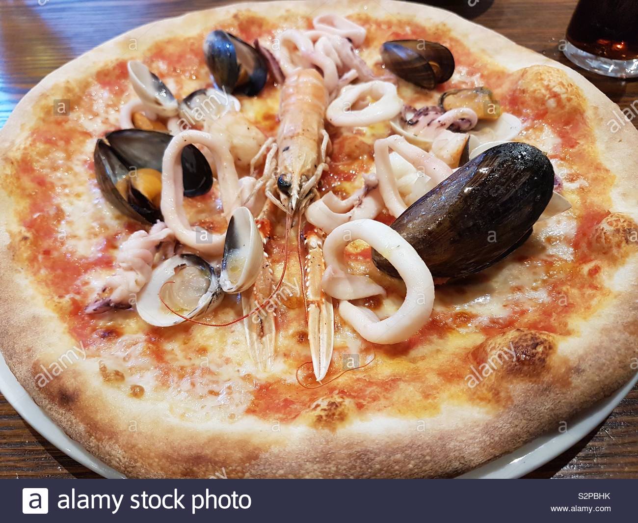 Pizza mit muscheln -Fotos und -Bildmaterial in hoher Auflösung – Alamy
