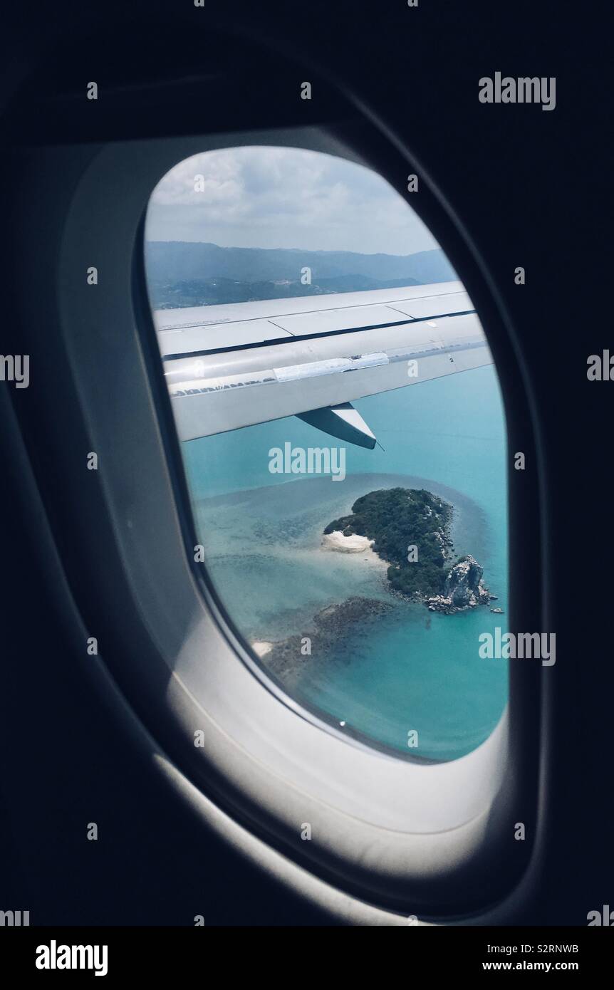 Ozean aus dem Flugzeug Fenster Stockfoto