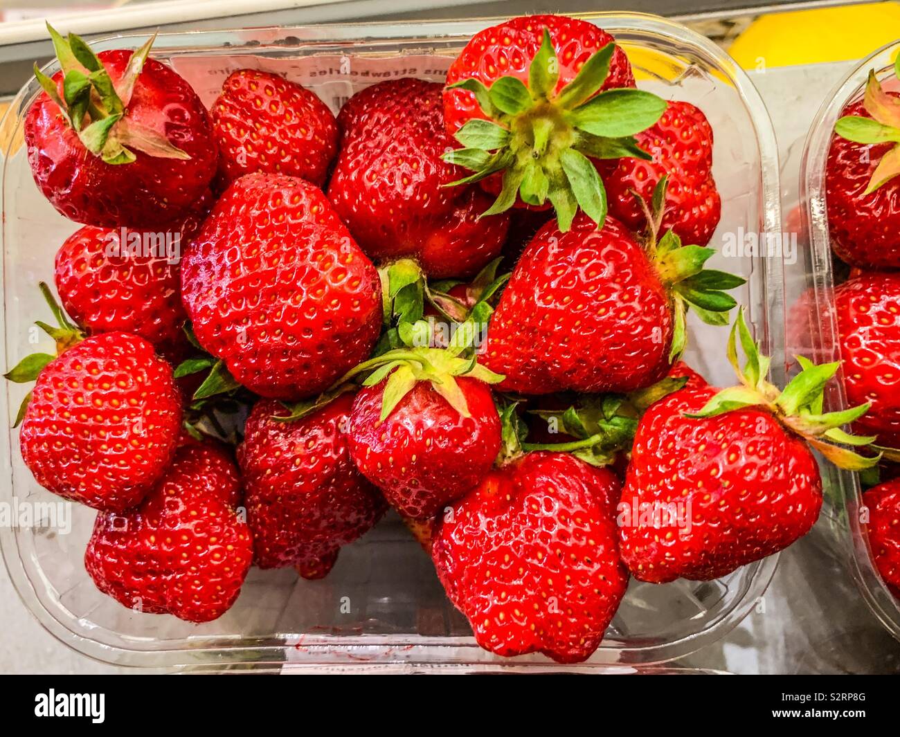 Punnet frische Erdbeere's Stockfoto