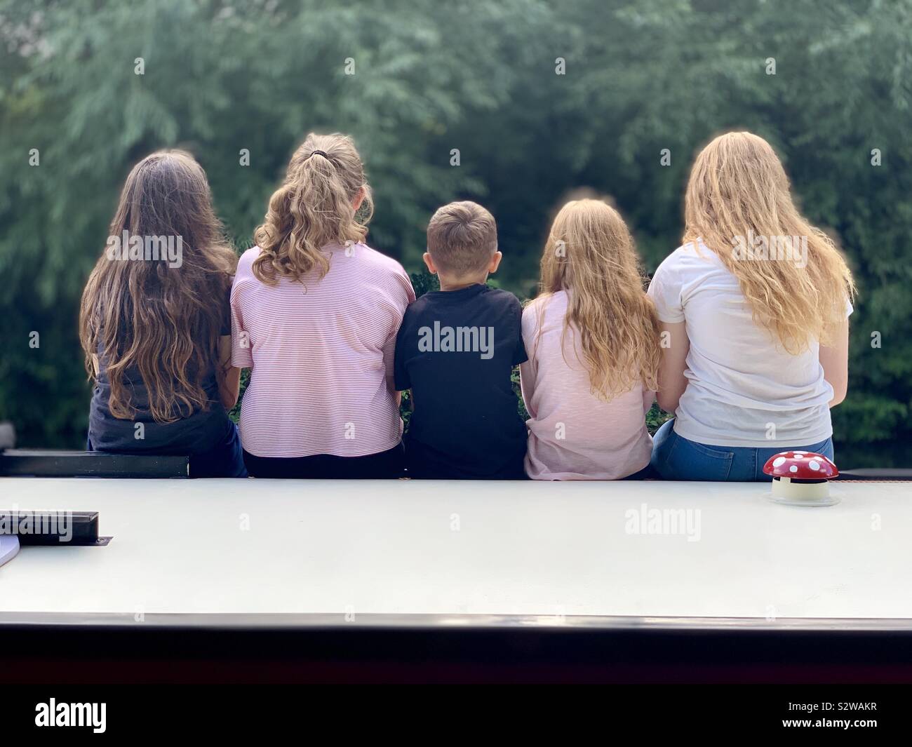 Kinder auf dem Boot Stockfoto