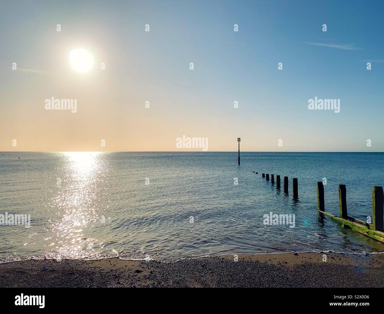 Morgen Sonne am Strand - Smartphone-aufgenommenes Stockfoto