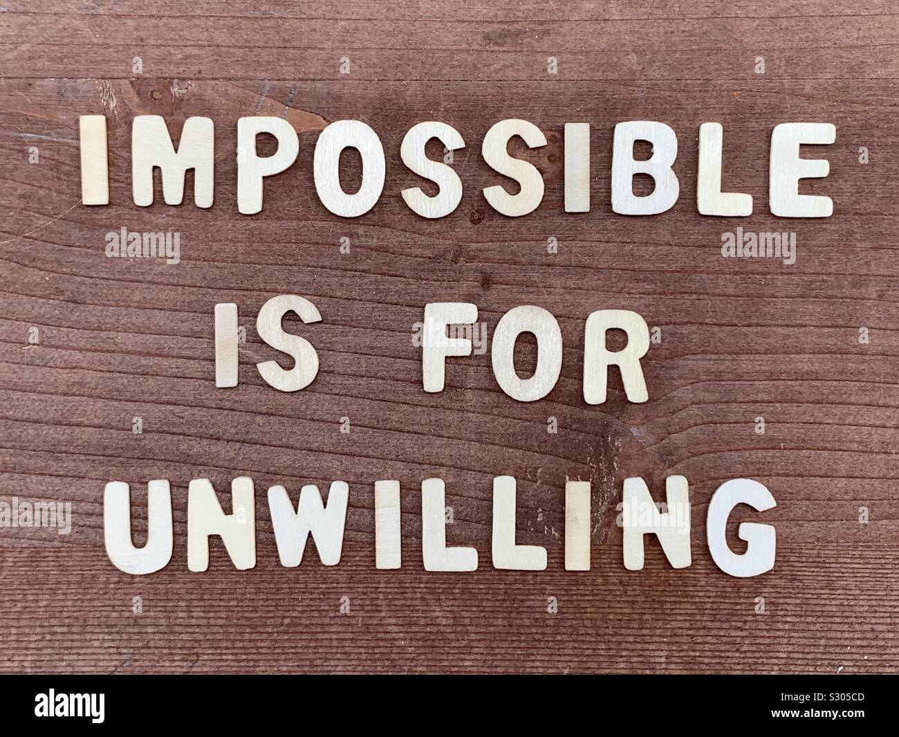 Unmöglich ist nicht bereit, motivationale Zitat aus Holz Buchstaben Stockfoto
