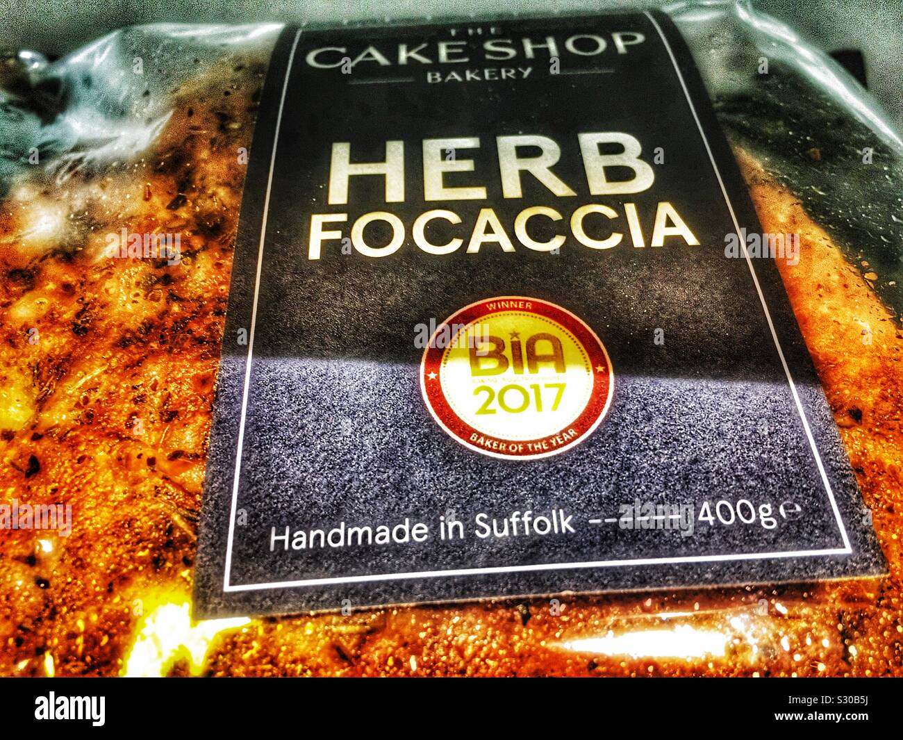Die Konditorei Bäckerei Kraut Focaccia-brot - Smartphone-aufgenommenes Stockfoto