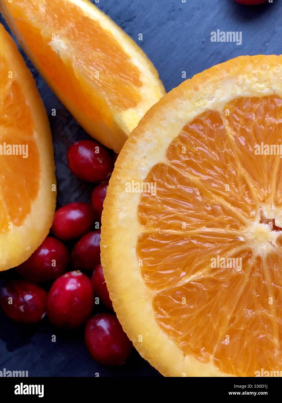 Preiselbeeren und Orangen Stockfoto