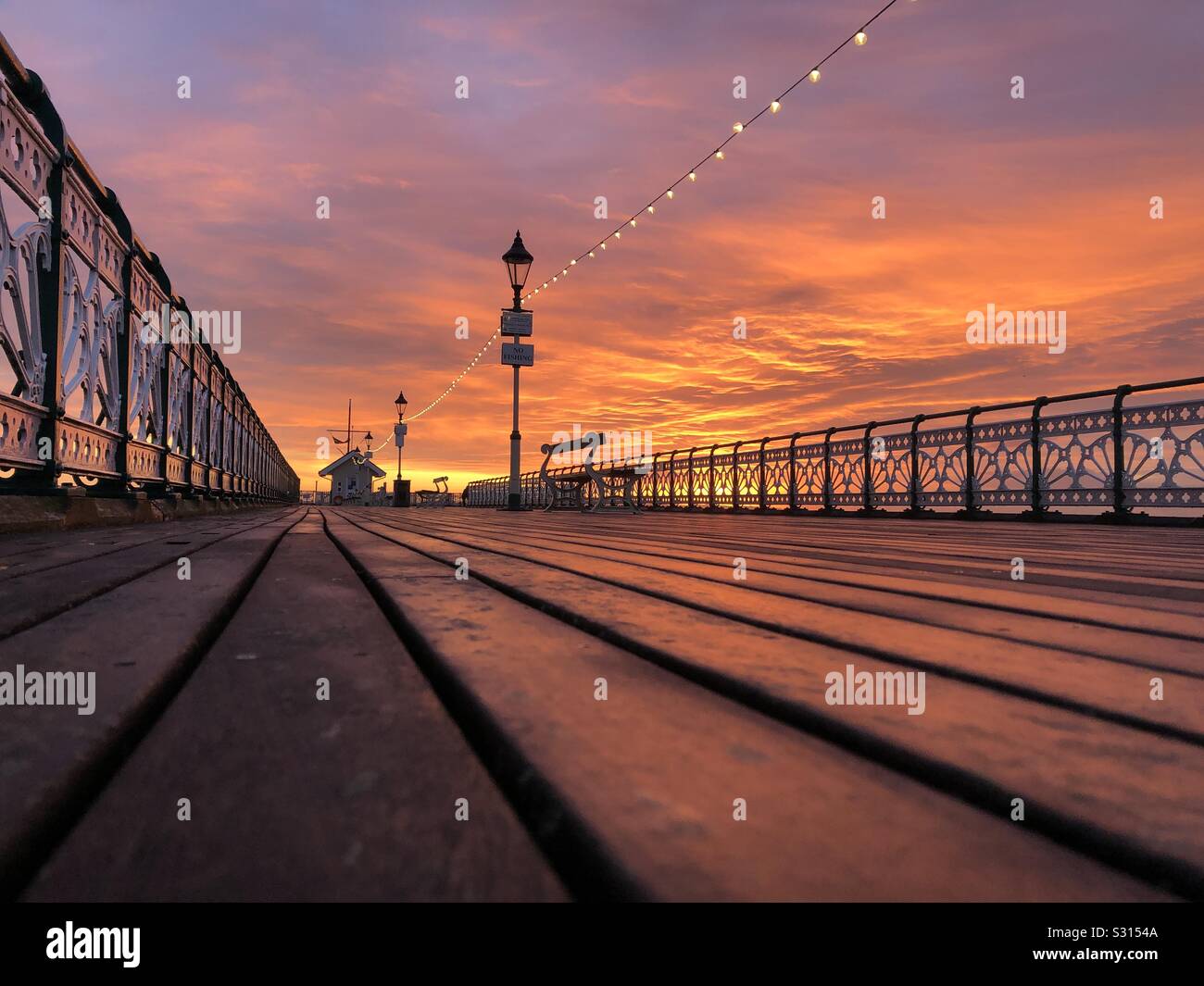 Penarth Pier bei Sonnenuntergang, Dezember. Stockfoto