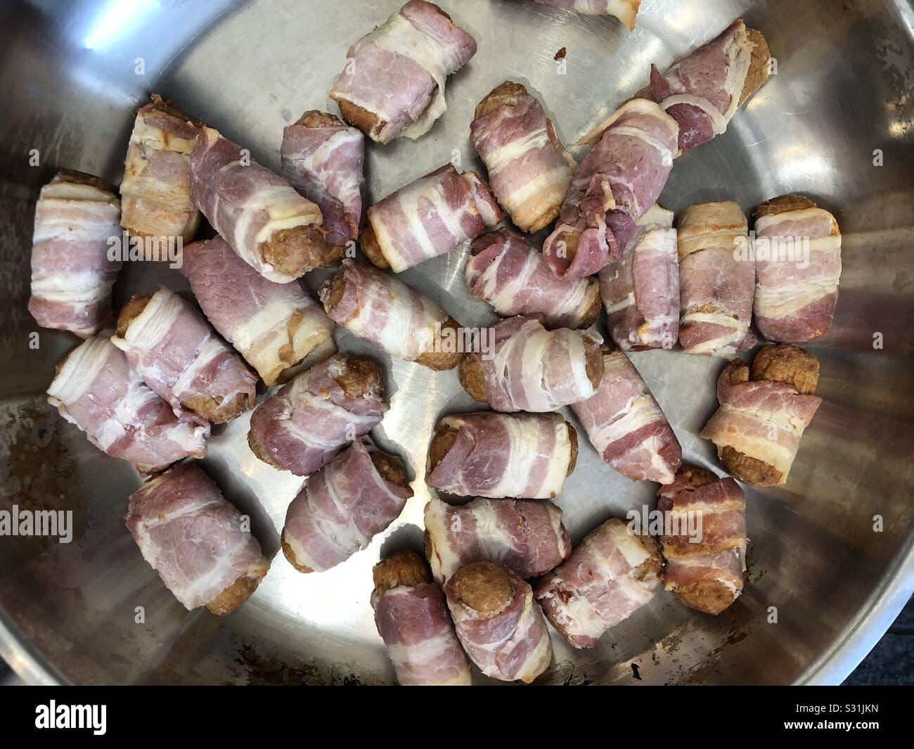 Schweine in Decken - Smartphone-aufgenommenes Stockfoto
