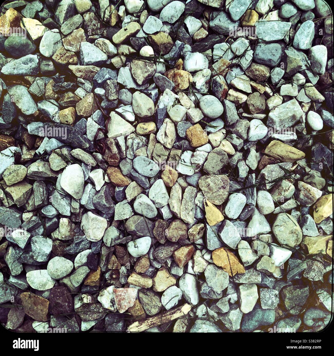 Kieselsteine und Steine Hintergrund. Stockfoto